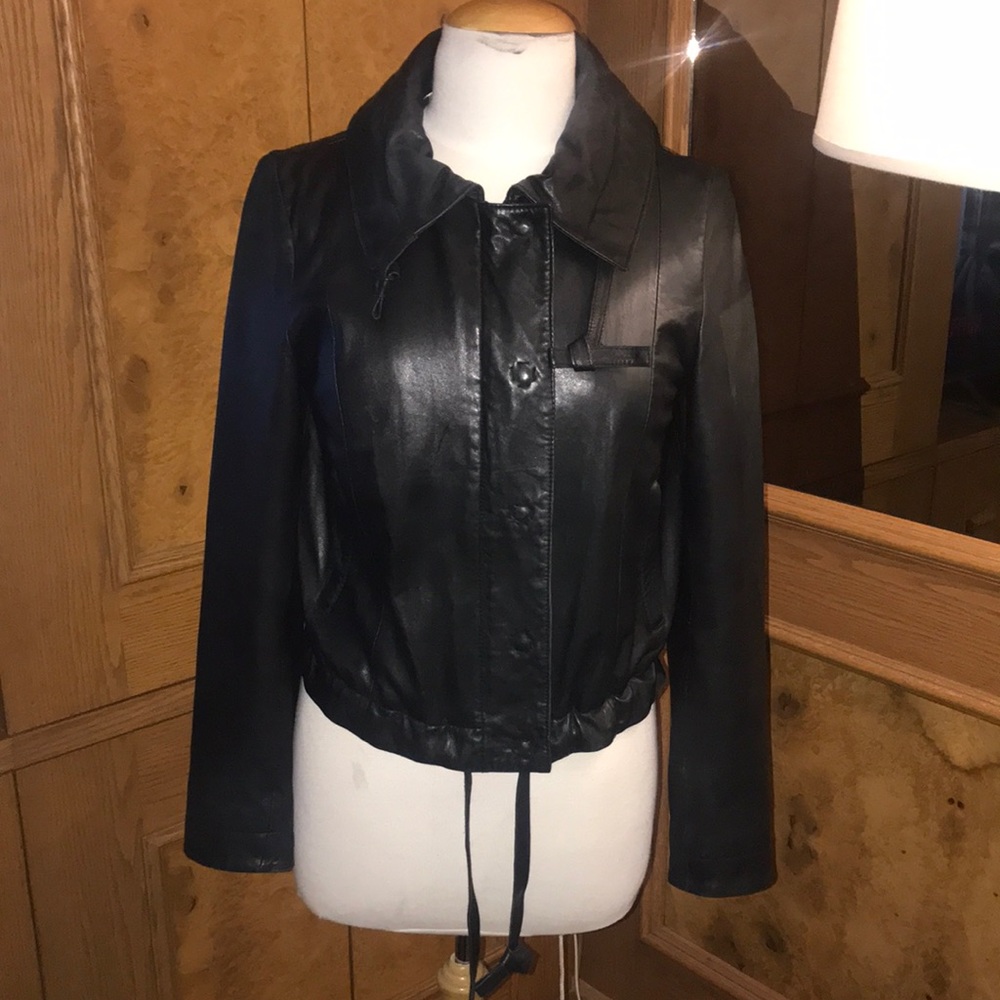 Black really soft leather jacket line the label